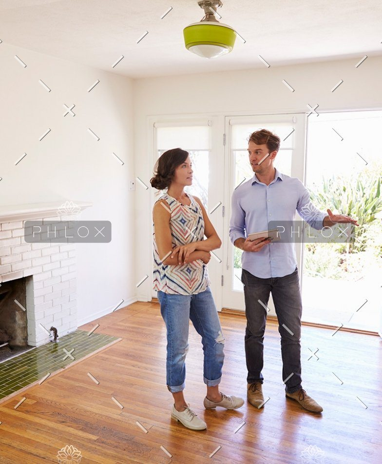 demo-attachment-41-male-realtor-showing-female-client-around-house-PXLCYLL-784x951
